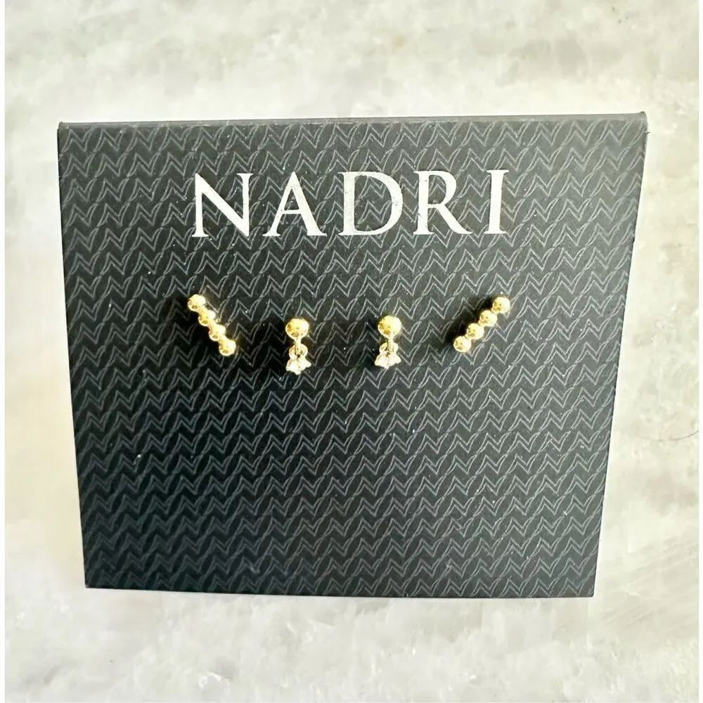 Gold set of two petite Nadri stud earrings ￼